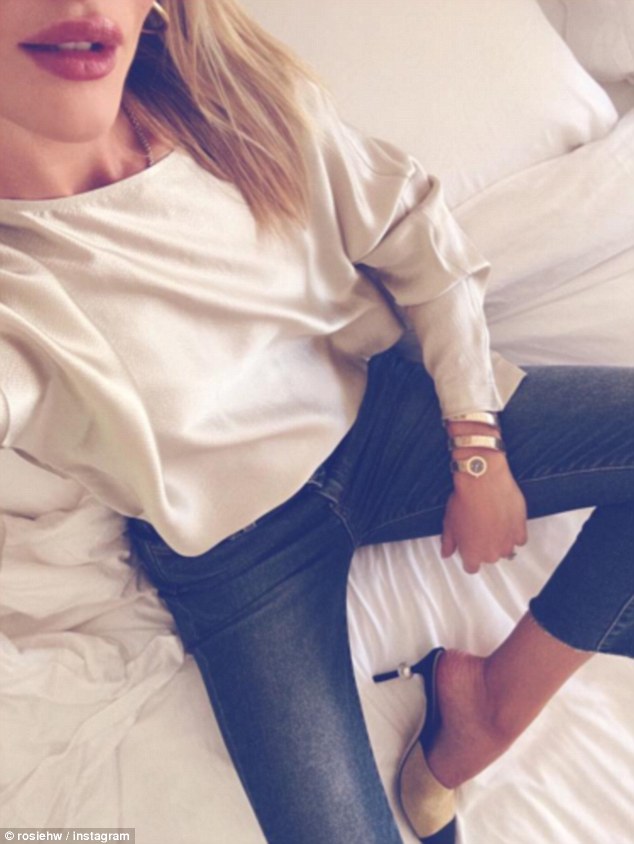 Celebrity fans: British model, Rosie Huntington-Whiteley, among others, have shared denim-clad selfies (pictured)
