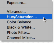 Adding a Hue/Saturation adjustment layer to use for whitening the teeth.