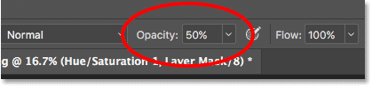 Lowering the brush opacity in the Options Bar to 50 percent