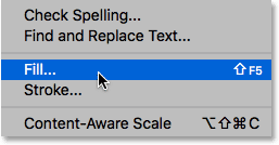 Selecting the Fill command from under the Edit menu in Photoshop. 
