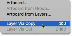 Choosing the New Layer via Copy command from the Layer menu in Photoshop