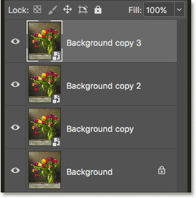 The three Smart Objects and the Background layer in the Layers panel