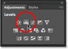 Clicking the Levels icon in the Adjustments panel.