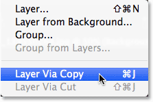 Selecting the New Layer via Copy command from the Layers menu in Photoshop.