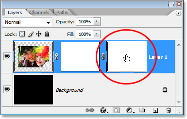 Adobe Photoshop tutorial image: Clicking on the vector mask thumbnail to select it in the Layers palette in Photoshop.